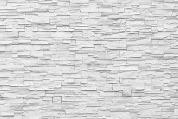 Photo sur Aluminium Pierres Mur blanc de surface de tons gris mur de pierre à utiliser comme arrière-plan.