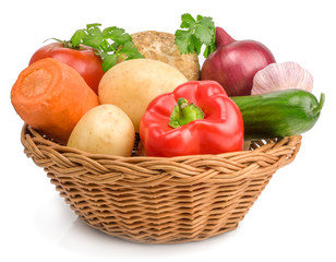 fresh vegetables in basket isolated on white background