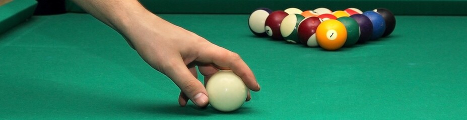 Banner of Billiard balls on green table and white ball