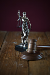Legal office of lawyer. legal model statue of Themis goddess of justice.