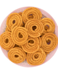 Indian Traditional Snack Chakli, a spiral shaped crisp deep fried snack, It is known as  Chakali, Murukku, Muruku, Murkoo, Chakri in Gujarat, Chakli in Maharashtra and Northern India