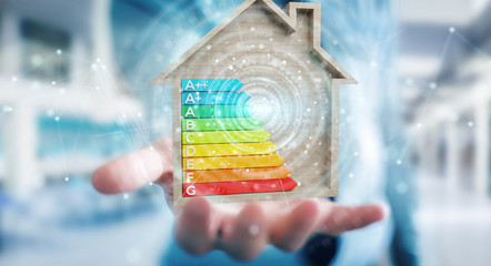 Businessman using 3D rendering energy rating chart in a wooden house