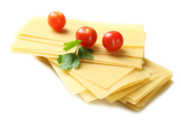 Dough for lasagna and tomatoes