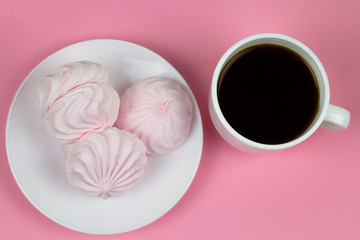 berry zephyr and coffee cup on a pink background