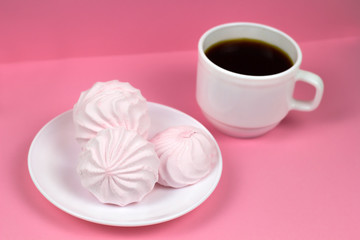 berry zephyr and coffee cup on a pink background