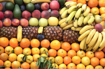 Different ripe fruits in supermarket