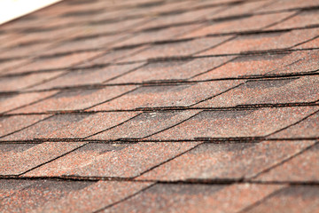 Obraz premium Close up of new roof with asphalt shingles