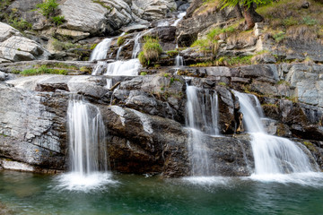 Fototapeta na wymiar Lillaz Waterfall near Cogne in Valle d’Aosta, Italy