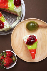 Piece of cake and strawberry kiwi jam topping