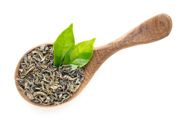 Green tea leaf the spoon isolated on white background.