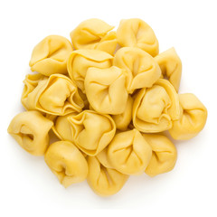 Raw homemade pasta,tortellini with herbs.