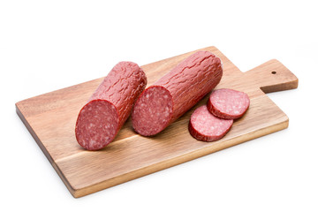 Salami smoked sausage, basil leaves on white background cutout.