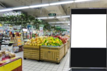 The background of the blurred mall in the foreground for the advertising light box