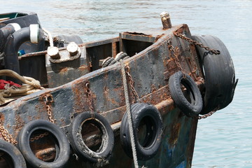 Ship bow cover with old tires 