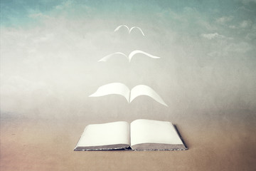 pages flying out of a book