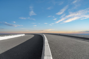 Empty highway asphalt road and beautiful sky landscape
