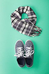 Woman's flat lay clothes gray hat scarf in a box