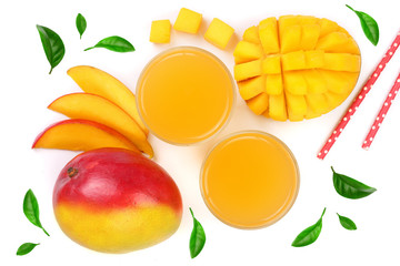 Mango juice and fruit decorated with leaves isolated on white background close-up. Top view. Flat lay