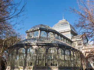 Fototapeta na wymiar Crystal Palace (Palacio de cristal) in Retiro Park,Madrid, Spain.