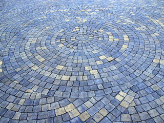 Cobblestone bridge made from figured stones. Stony texture