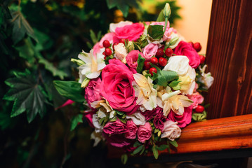 beautiful wedding bouquet with pink roses and white flowers closeup