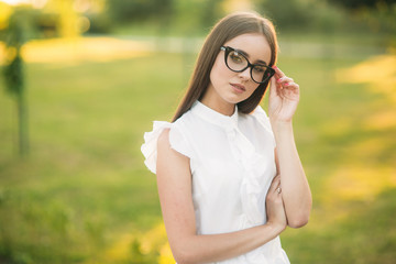 Business woman in the park.