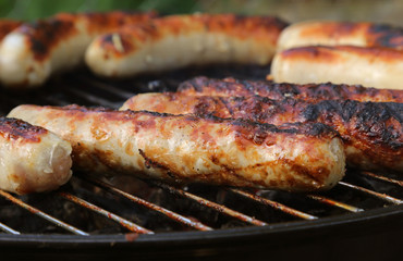 Grilled sausages on a grill