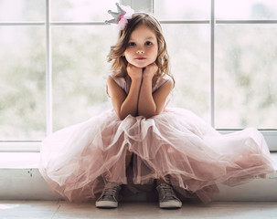 Little cute girl in dress