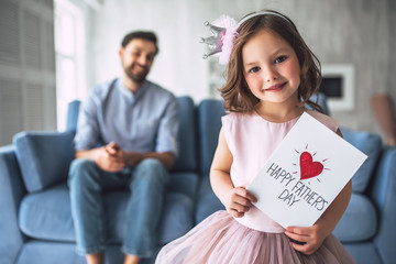 Dad with daughter at home