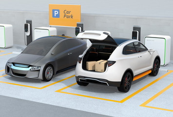 White SUV in parking lot with trunk opened, cardboard boxes inside. Concept for car trunk delivery service. 3D rendering image. © chesky