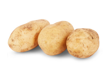 Three large, young potatoes on a white background