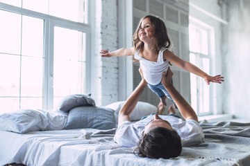 Dad with daughter at home