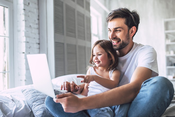 Dad with daughter at home