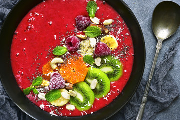 Healthy raspberry banana smoothie bowl .Top view.
