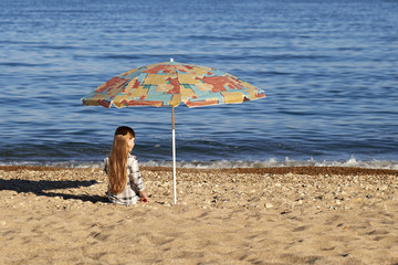 Little girl on the beach