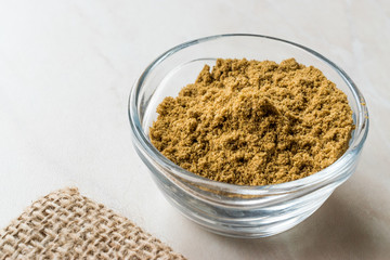 Cumin Powder in Glass Bowl with sack