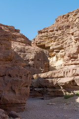 Beautiful geological formation in desert, colorful sandstone canyon walking route