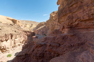 Fototapeta na wymiar Beautiful geological formation in desert, colorful sandstone canyon walking route
