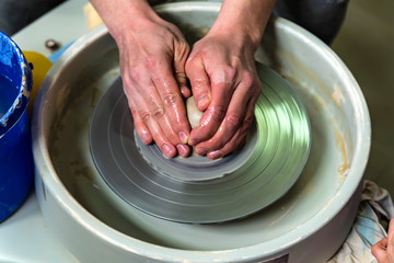 Working on potter's wheel close