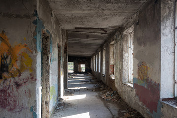 Fototapeta na wymiar Inside abandoned building, big hall