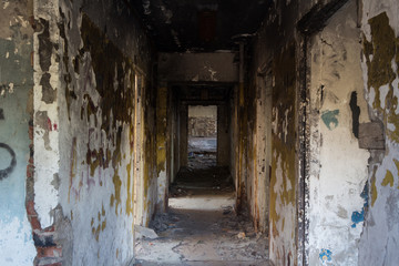 Fototapeta na wymiar Inside abandoned building, corridor