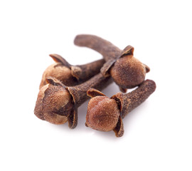 dry cloves on white background