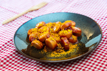 Tasty german sausage served with sauce