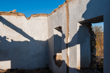 DESTROYED FORGED OLD HOUSE IN THE RURAL LOCATION.