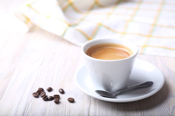 Cup of coffee and coffee beans