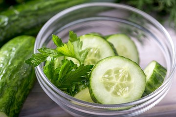 Cucumber slices in a  glass bowl