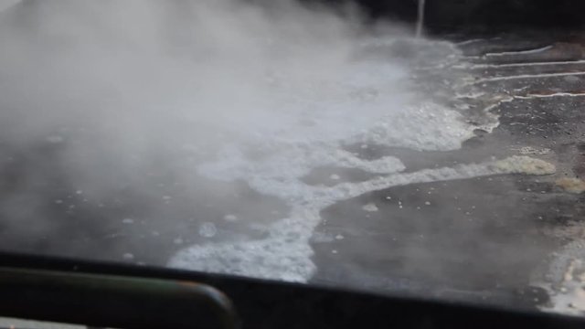 Cleaning the griddle