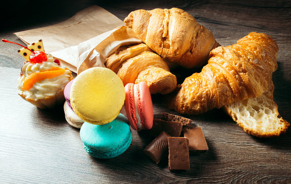 French pastries, desserts: croissants, macaroons, cake, chocolate