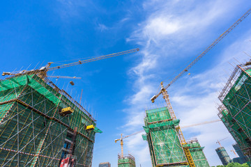 Naklejka premium crane in construction site