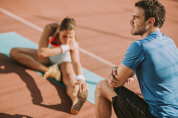 Fototapeta premium Woman training with personal trainer